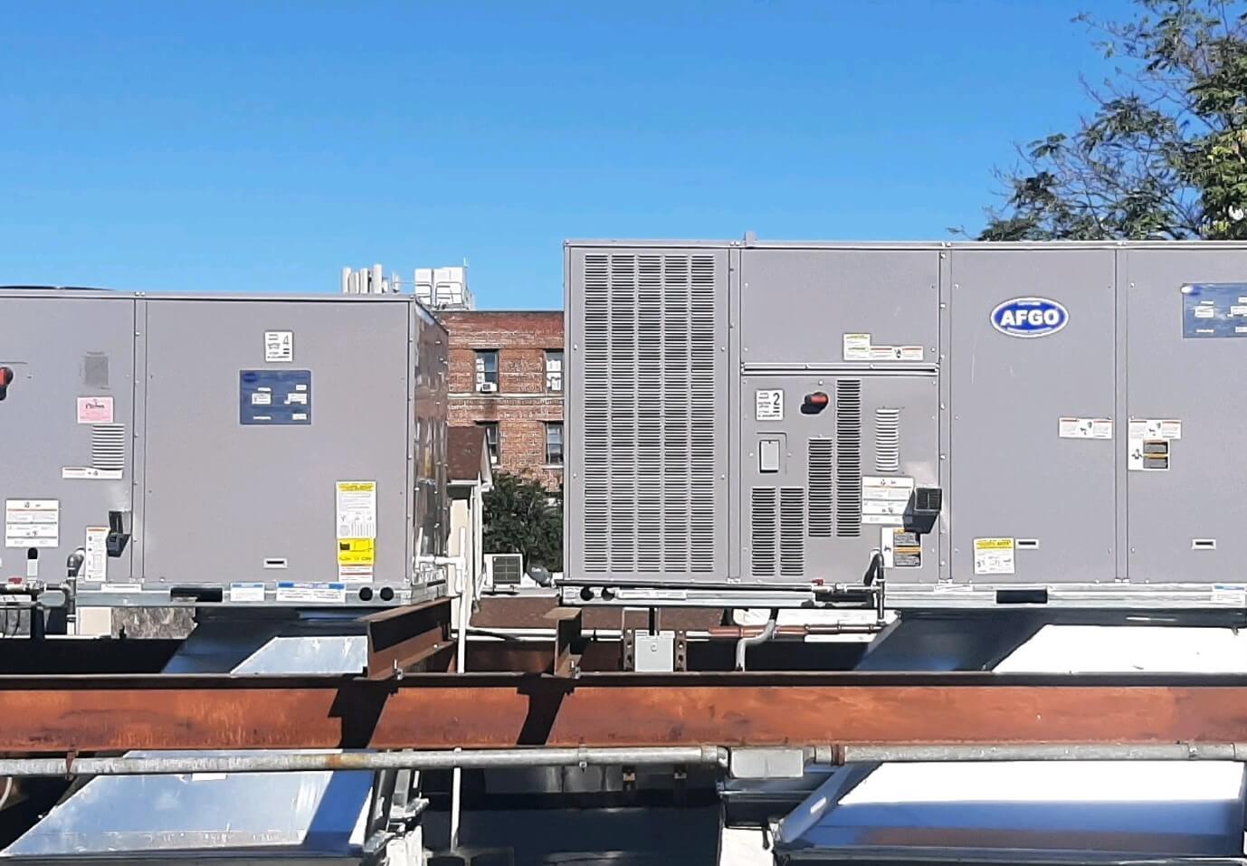 Carrier HVAC system on the rooftop of a building.